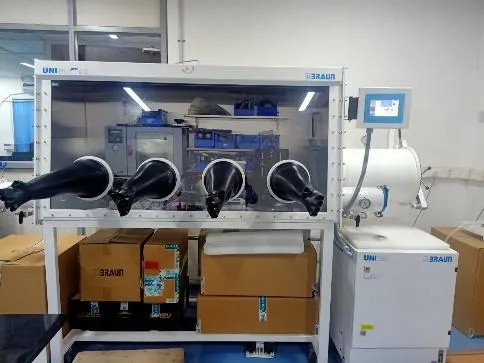 Four-port glove box with in-built vacuum oven facility